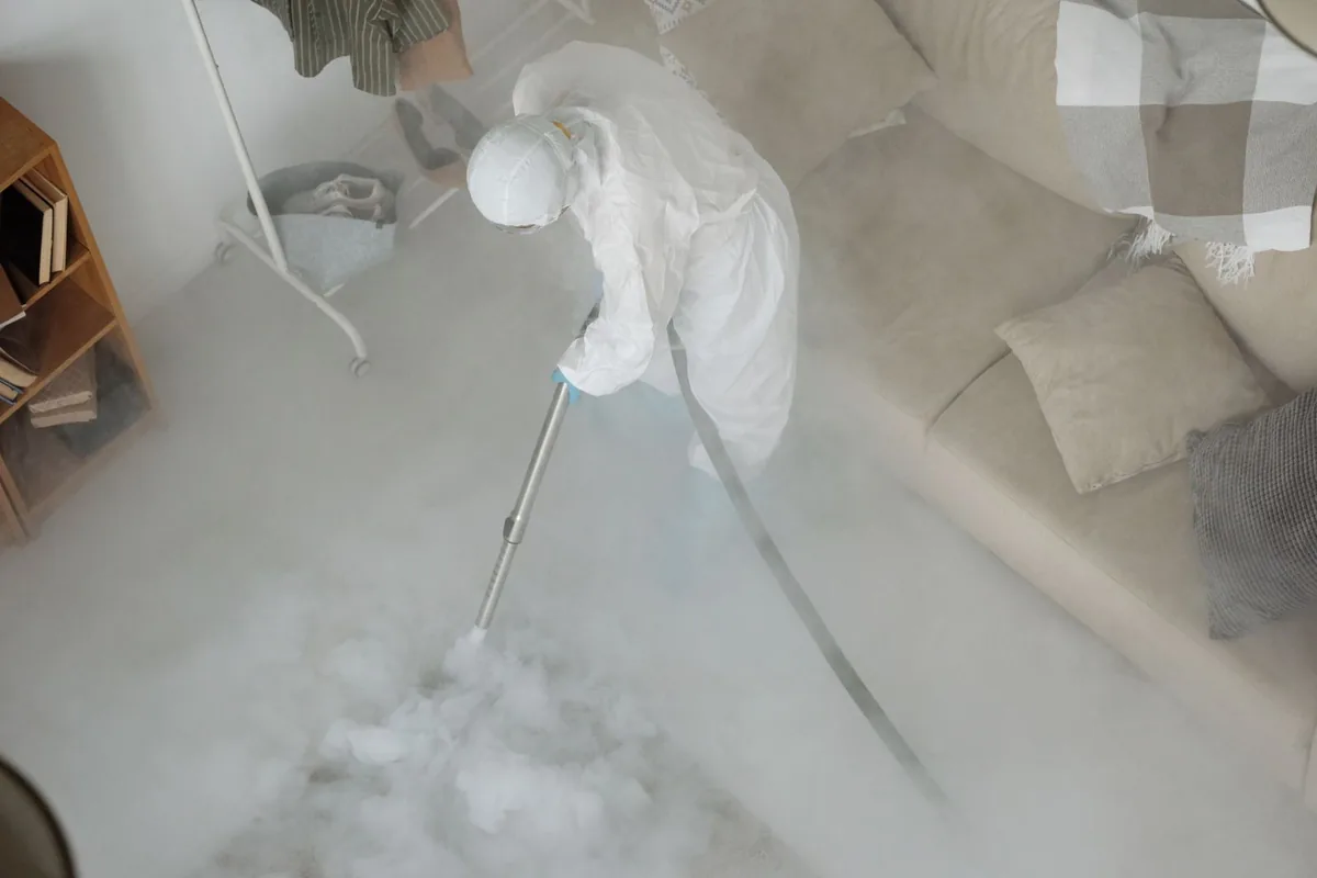 Biohazard cleanup technician in protective equipment, Union City, MI